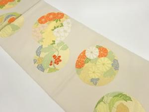 丸文に草花模様織出し全通袋帯